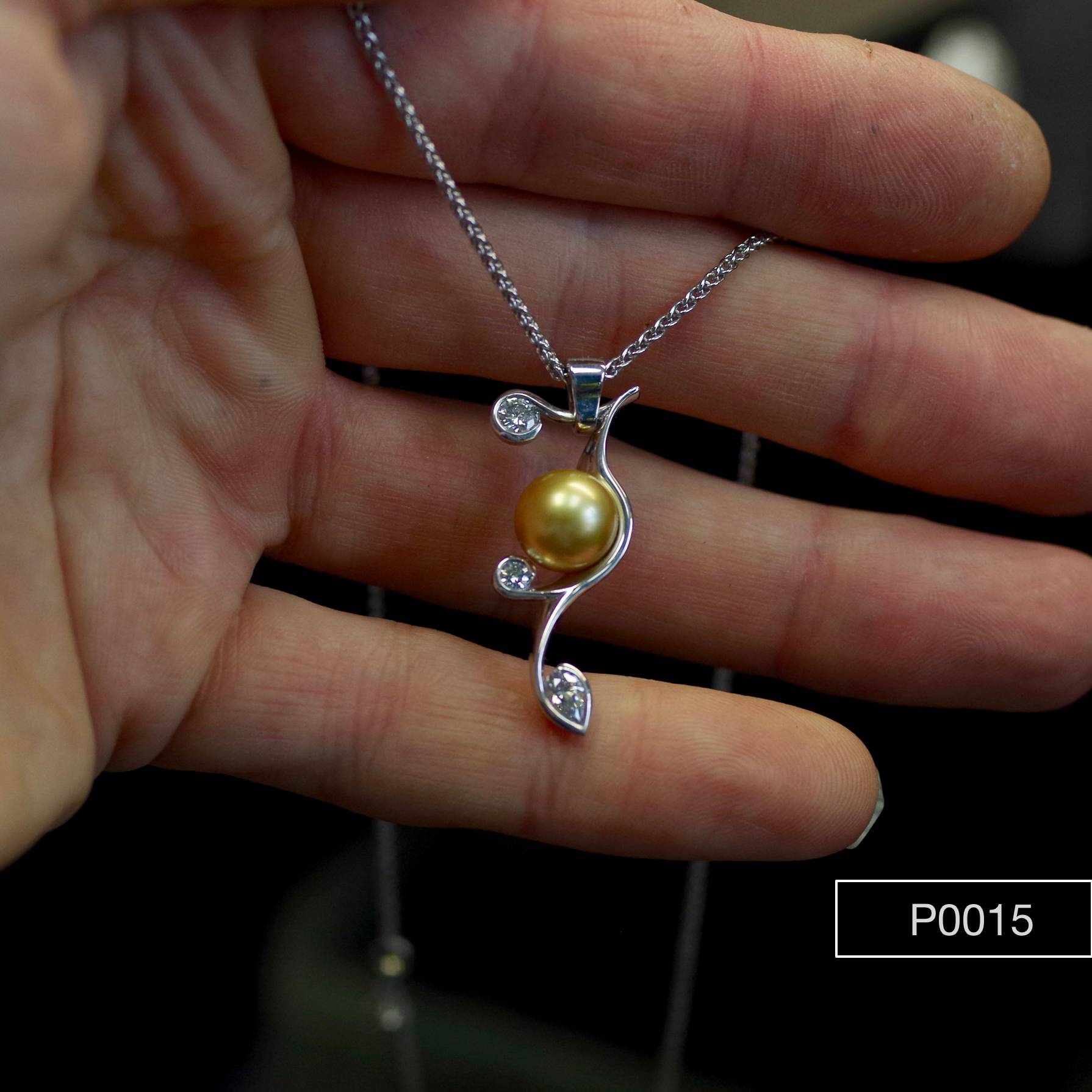 Gold south sea pearl in Diamond set 18ct white Gold Pendent. 