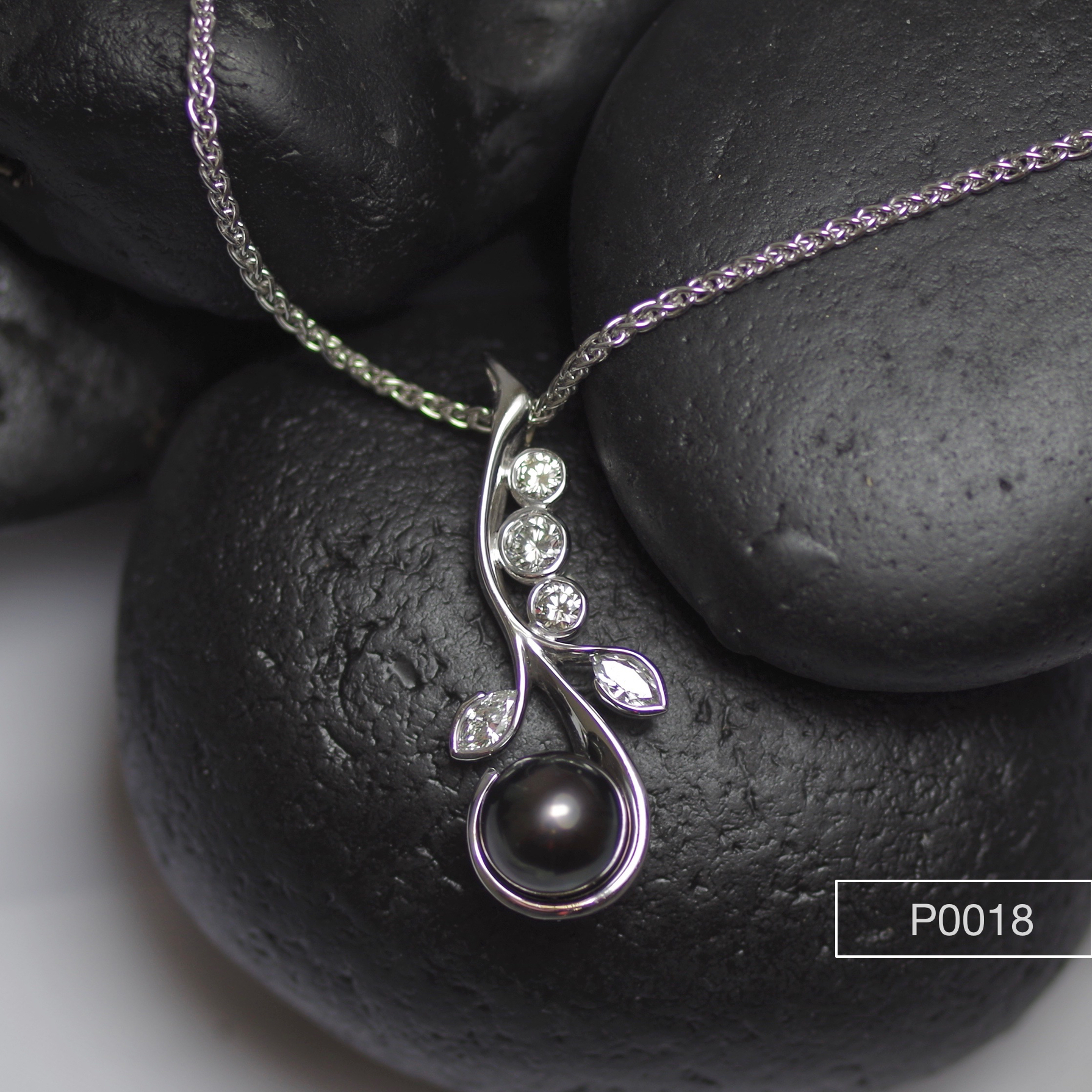 Tahitian pearl in 18ct white Gold Diamond set pendent.
